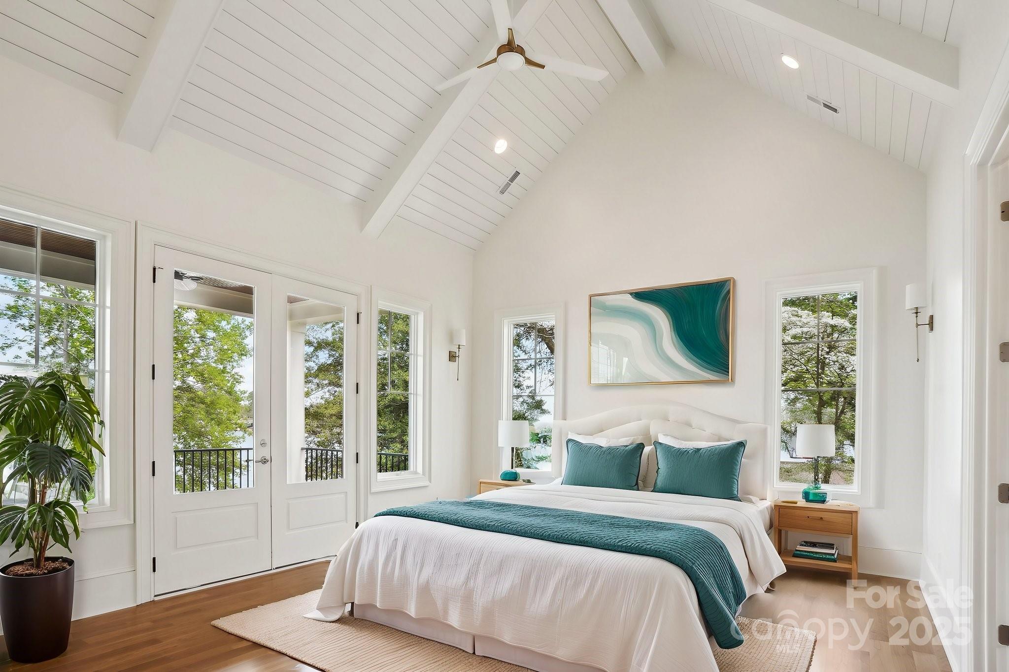 8813 Graham Road Denver, NC 28037 - Photo 15 of 35 a bedroom with a large bed and a large window