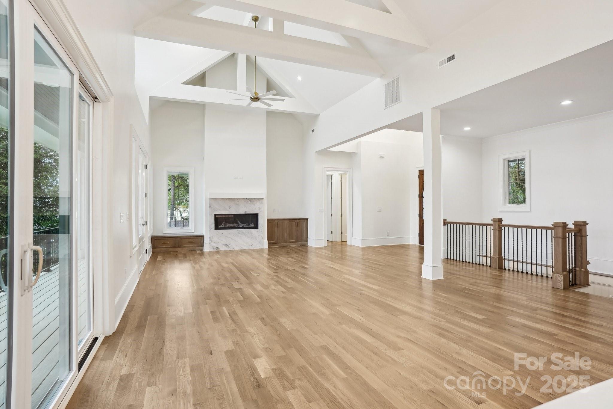 8813 Graham Road Denver, NC 28037 - Photo 17 of 35 a view of a livingroom with wooden floor
