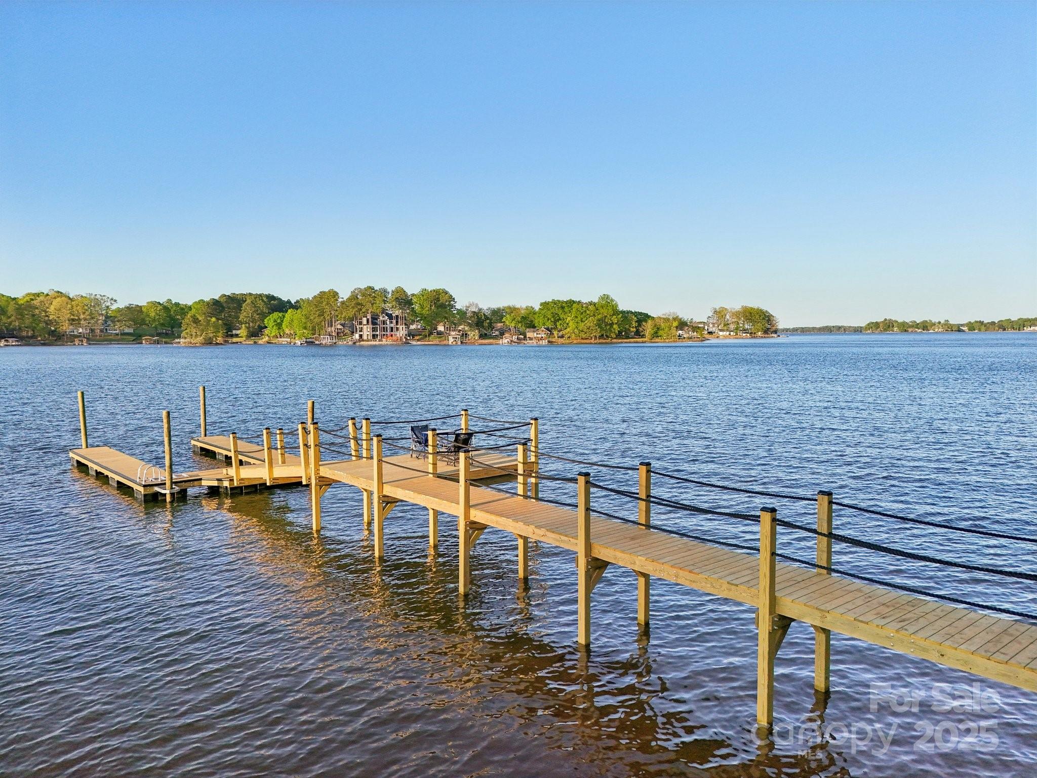 8813 Graham Road Denver, NC 28037 - Photo 4 of 35 a view of a lake with outdoor seating