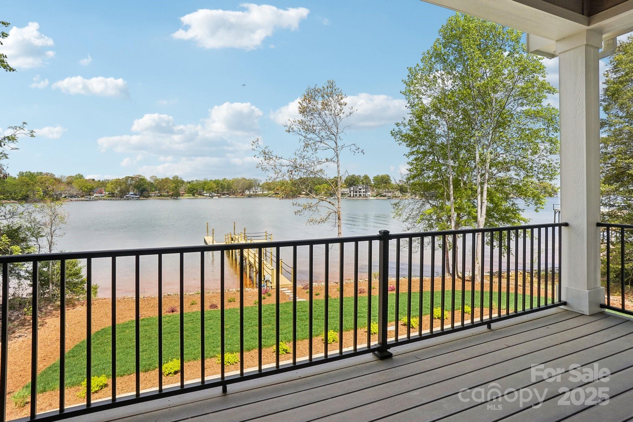 8813 Graham Road Denver, NC 28037 - Photo 8 of 35 a view of a balcony with wooden floor