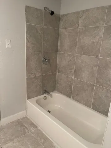 a bathroom with a bathtub