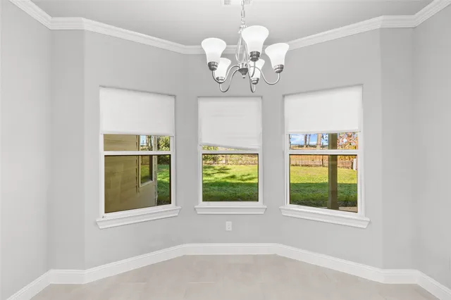 en view of an empty room with a window