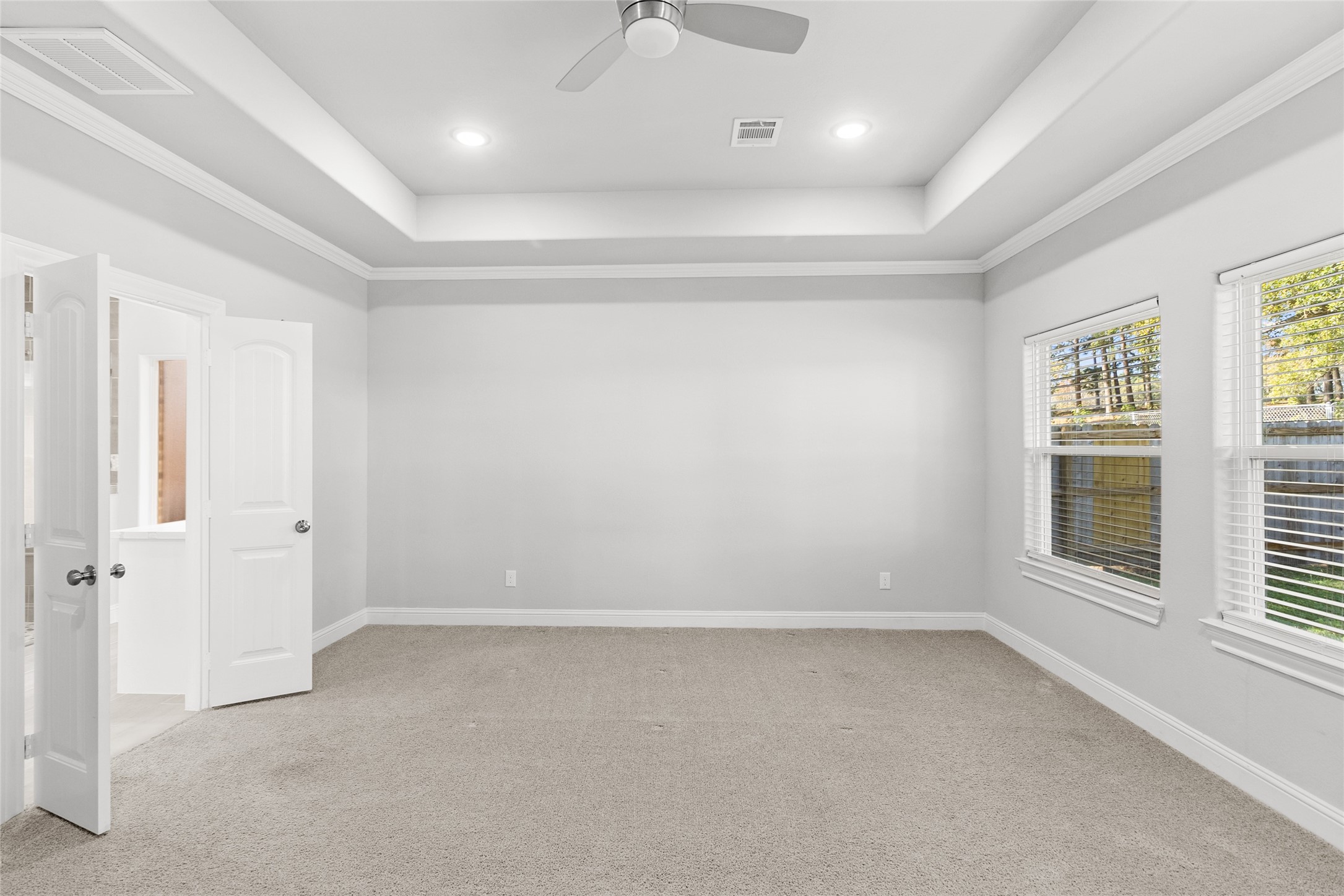 116 Augusta Drive Huntsville, TX 77340 - Photo 20 of 30 an empty room with a empty space and windows