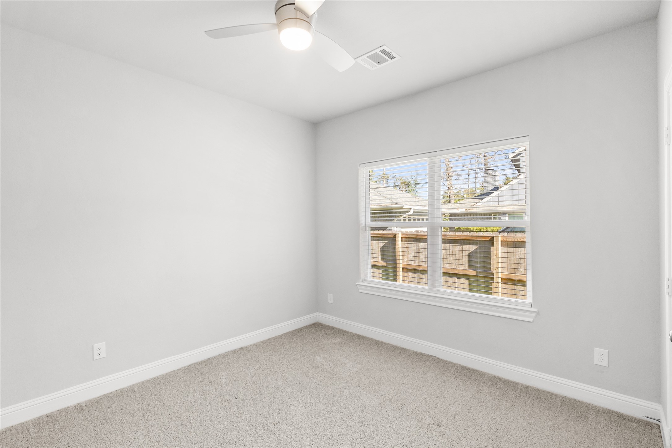 116 Augusta Drive Huntsville, TX 77340 - Photo 25 of 30 an empty room with a window