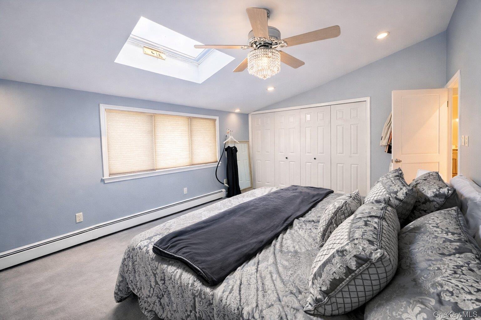42 Shinbone Lane Commack, NY 11725 - Photo 11 of 23 a bedroom with a bed and a window