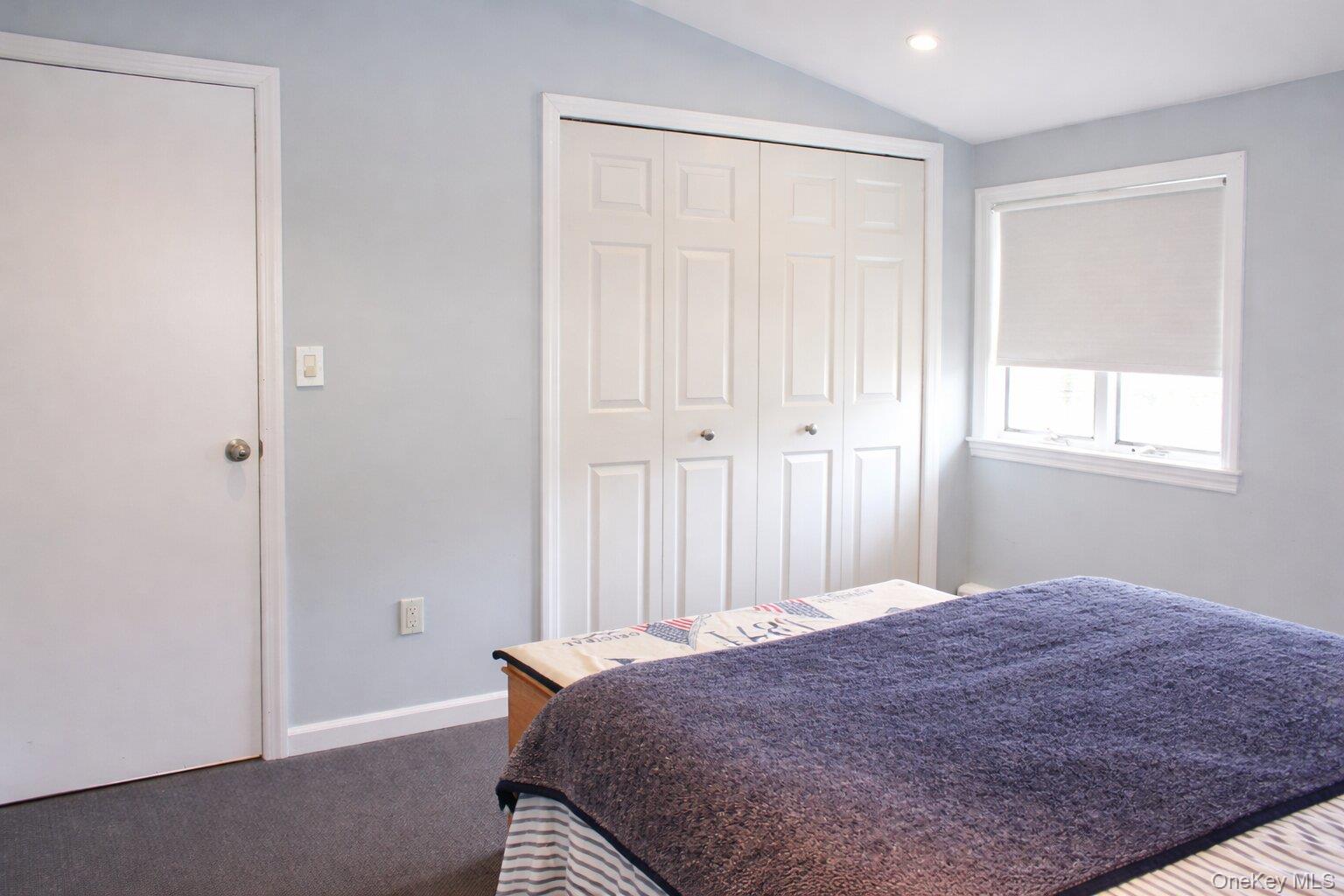 42 Shinbone Lane Commack, NY 11725 - Photo 14 of 23 a bedroom with a bed and a window