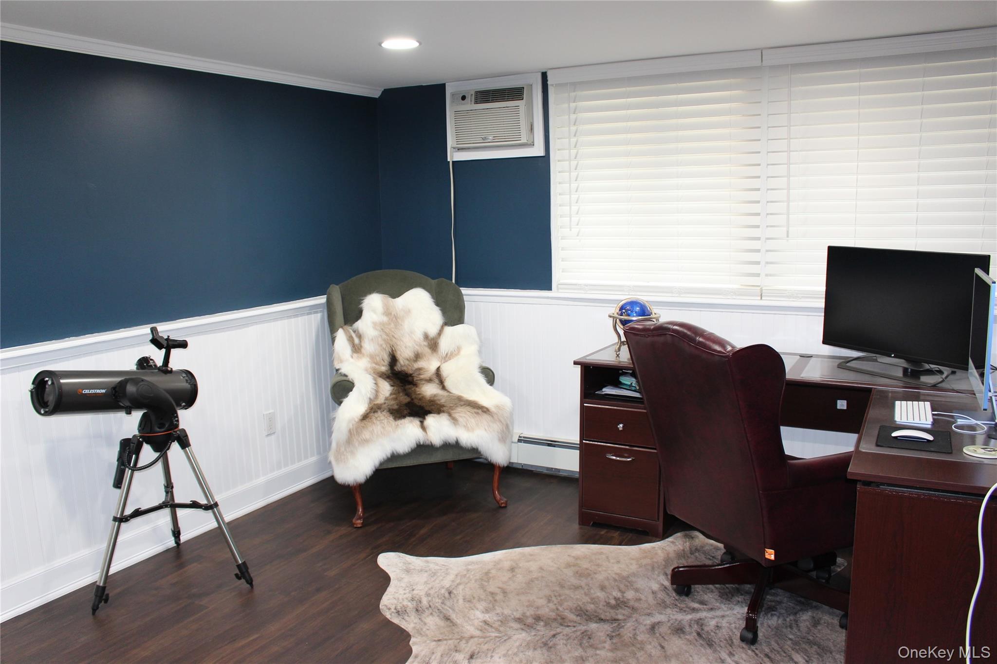 42 Shinbone Lane Commack, NY 11725 - Photo 16 of 23 a living room with furniture and a flat screen tv