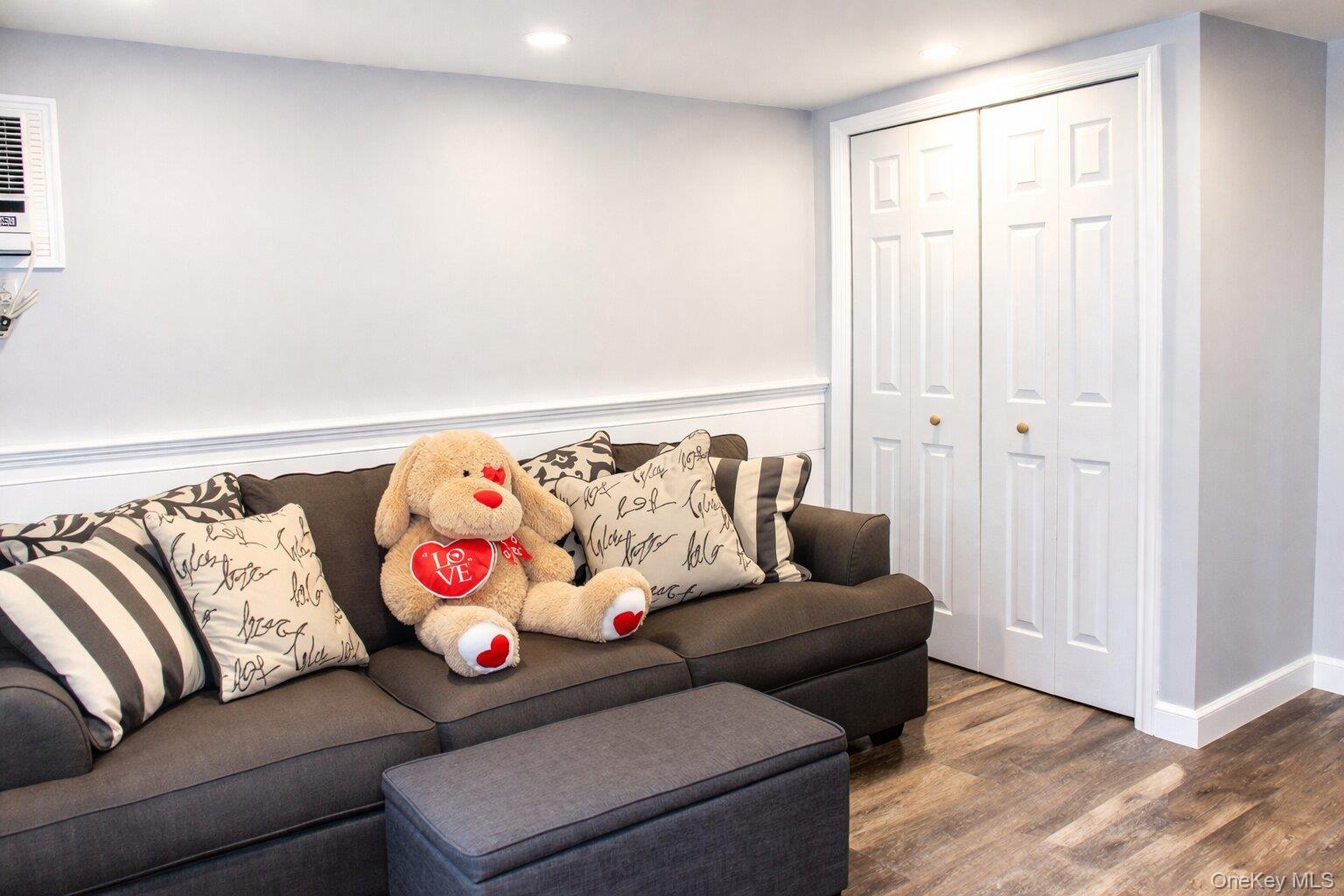 42 Shinbone Lane Commack, NY 11725 - Photo 18 of 23 a living room with furniture and a couch