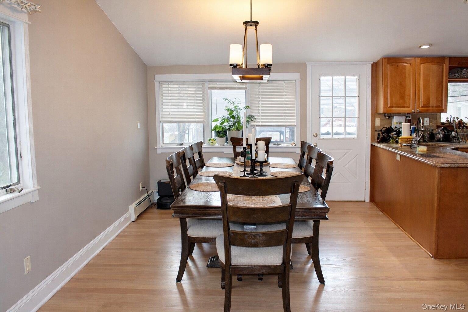 42 Shinbone Lane Commack, NY 11725 - Photo 5 of 23 a view of a dining room with furniture window and outside view