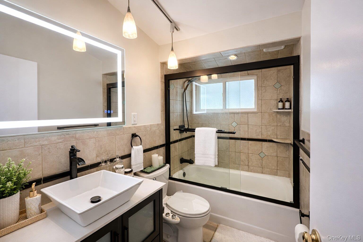 42 Shinbone Lane Commack, NY 11725 - Photo 9 of 23 a bathroom with a sink toilet and mirror