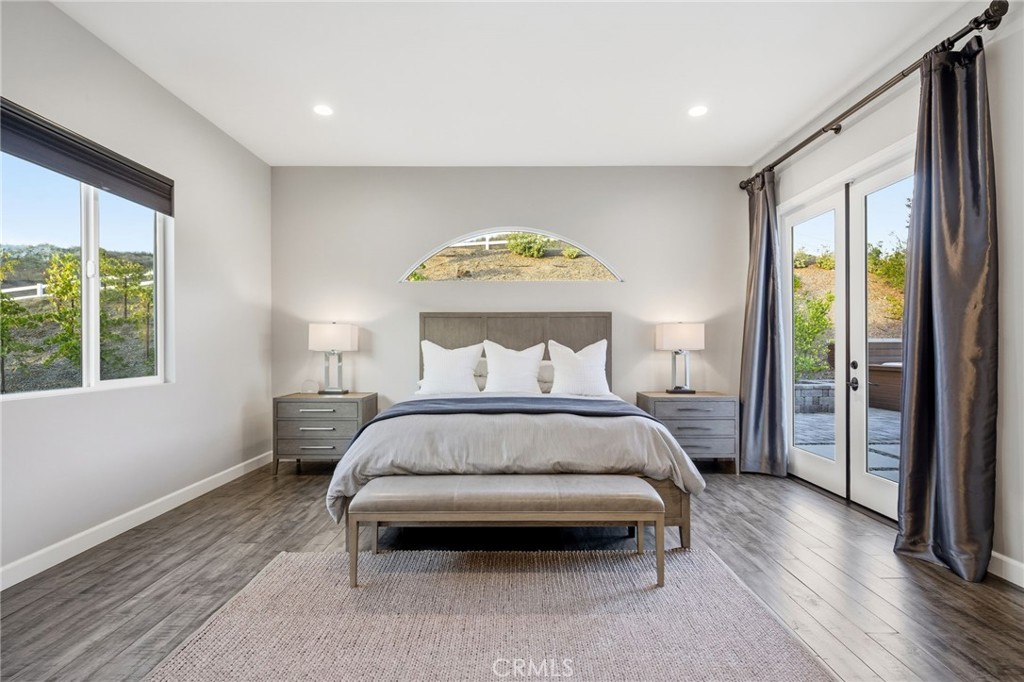 42339 Casa Verde Temecula, CA 92592 - Photo 23 of 59 a bedroom with a bed and a large window