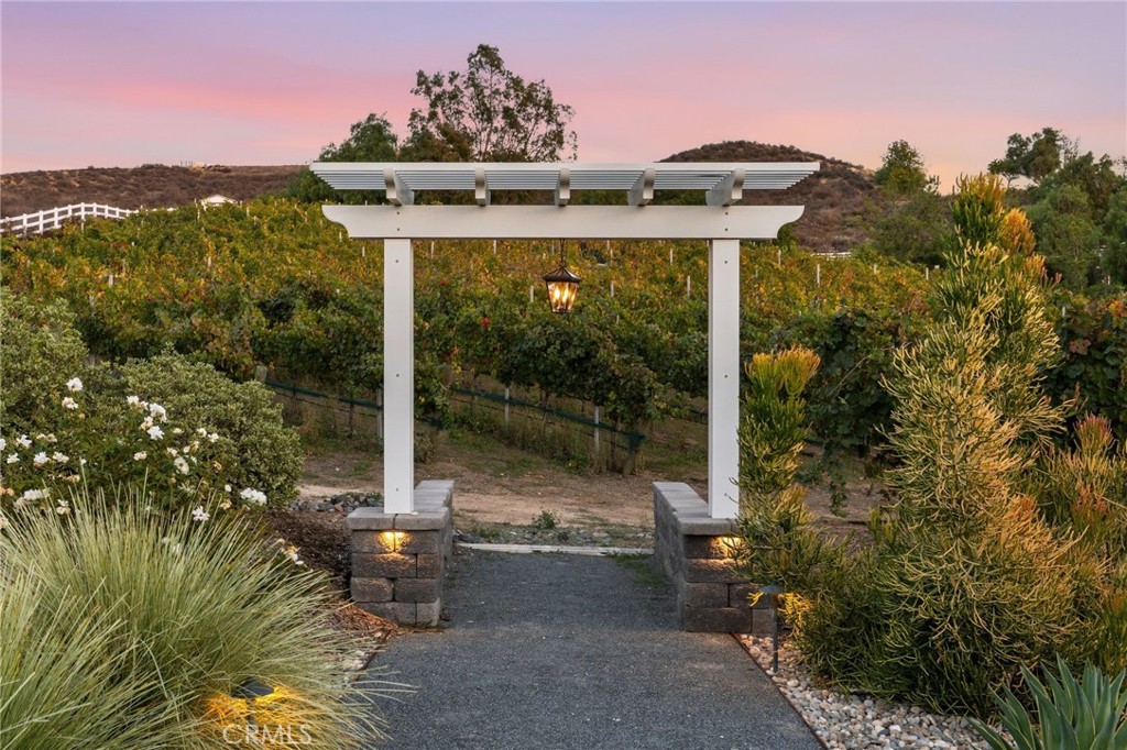 42339 Casa Verde Temecula, CA 92592 - Photo 45 of 59 a front view of a house with a yard