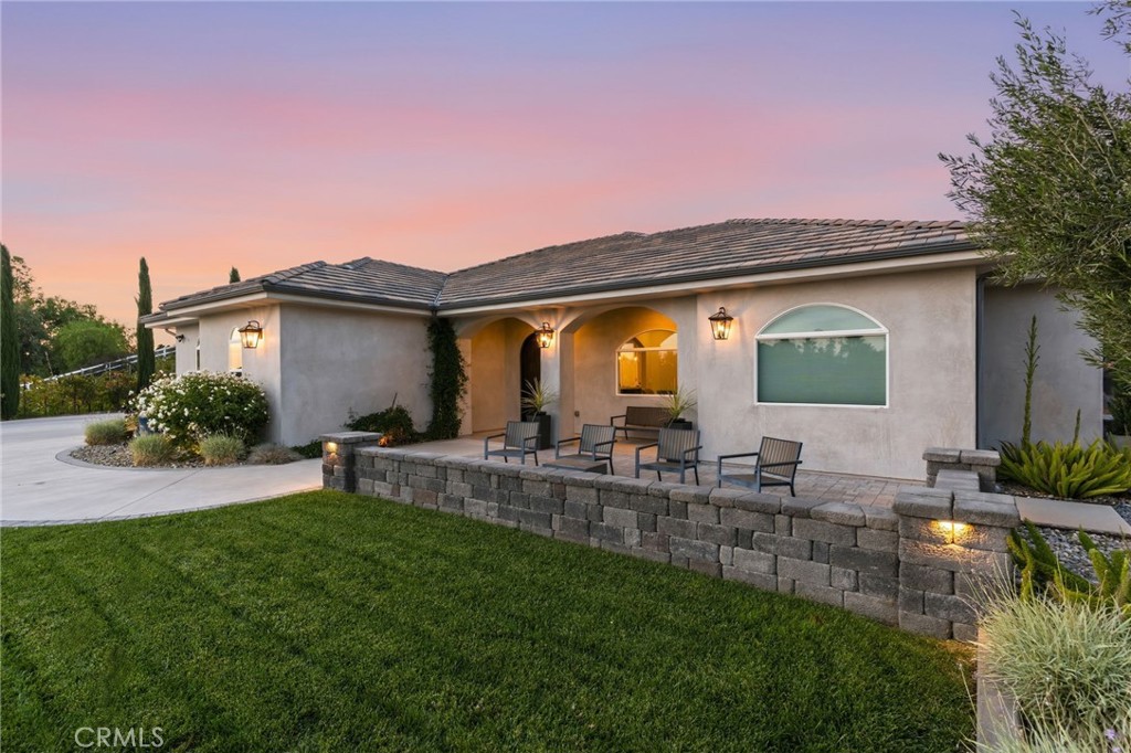 42339 Casa Verde Temecula, CA 92592 - Photo 49 of 59 a view of house with backyard and outdoor seating
