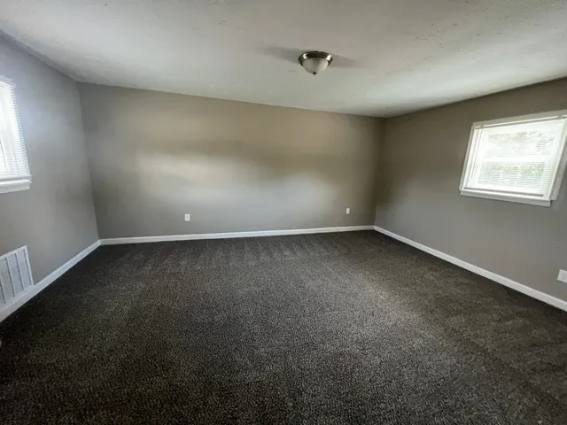 a view of a house with a patio