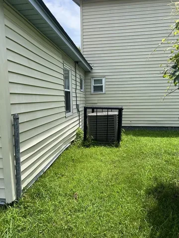 a view of a back yard of the house