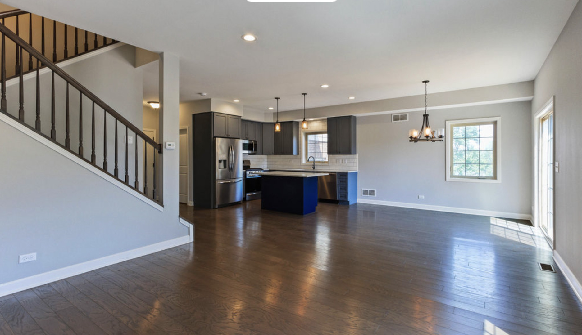 2205 Maple Hill Downers Grove, IL 60516 - Photo 2 of 18 a view of a kitchen and kitchen with furniture wooden floor and window