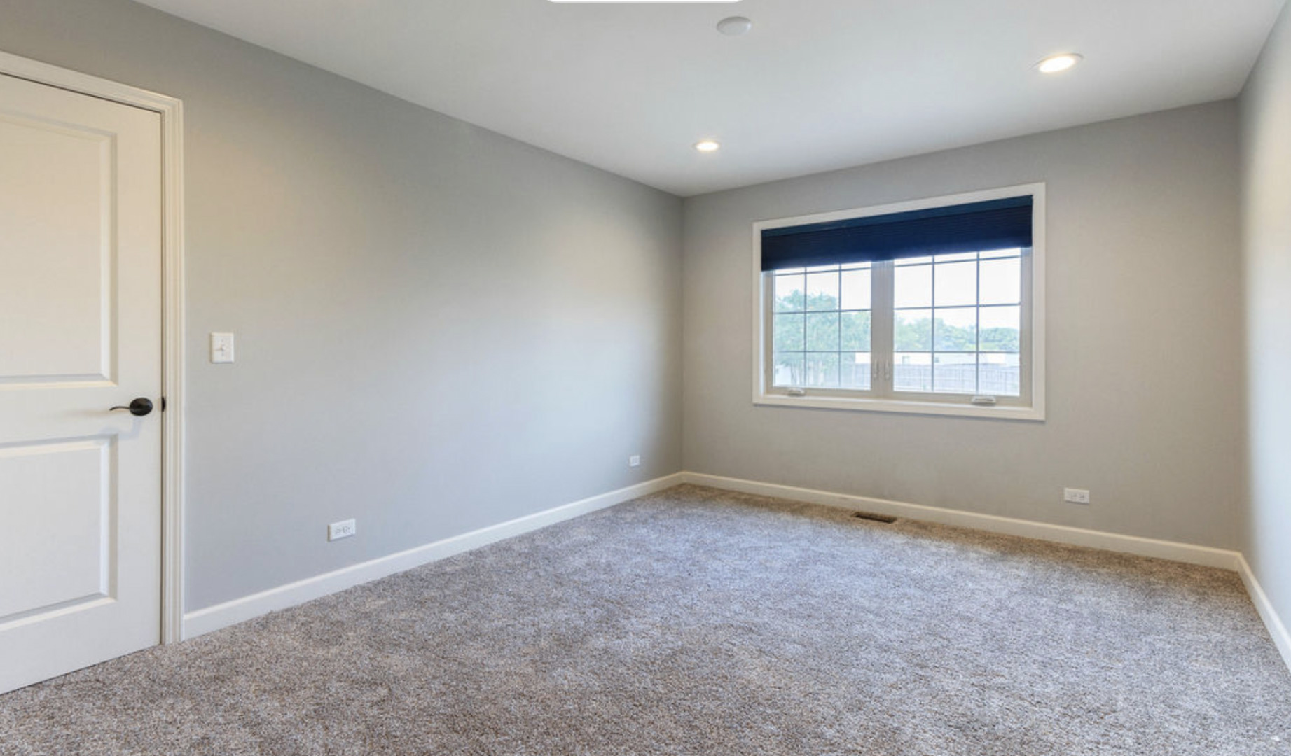 2205 Maple Hill Downers Grove, IL 60516 - Photo 8 of 18 an empty room with windows