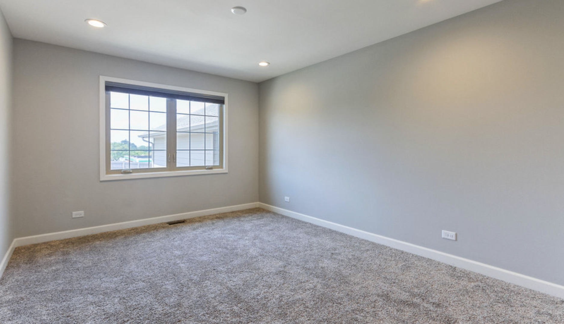 2205 Maple Hill Downers Grove, IL 60516 - Photo 9 of 18 an empty room with windows
