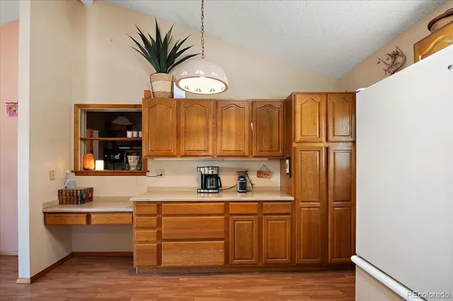 a bathroom with a sink a mirror and a window