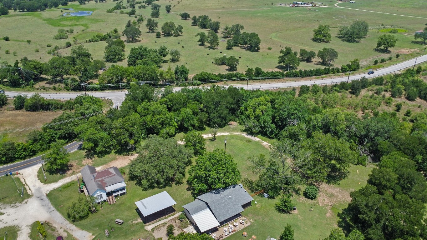 0 Fm-969 Road Manor, TX 78653 - Photo 16 of 33 an aerial view of residential houses with outdoor space and trees