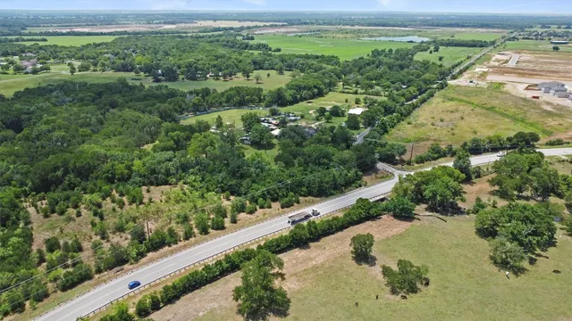 an aerial view of valley and lake