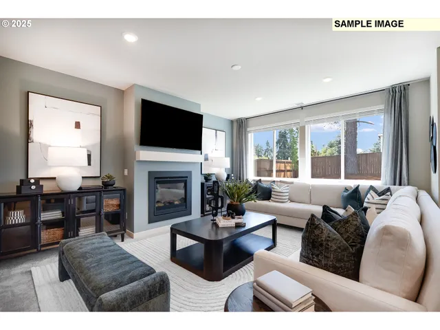 a living room with furniture fireplace and flat screen tv