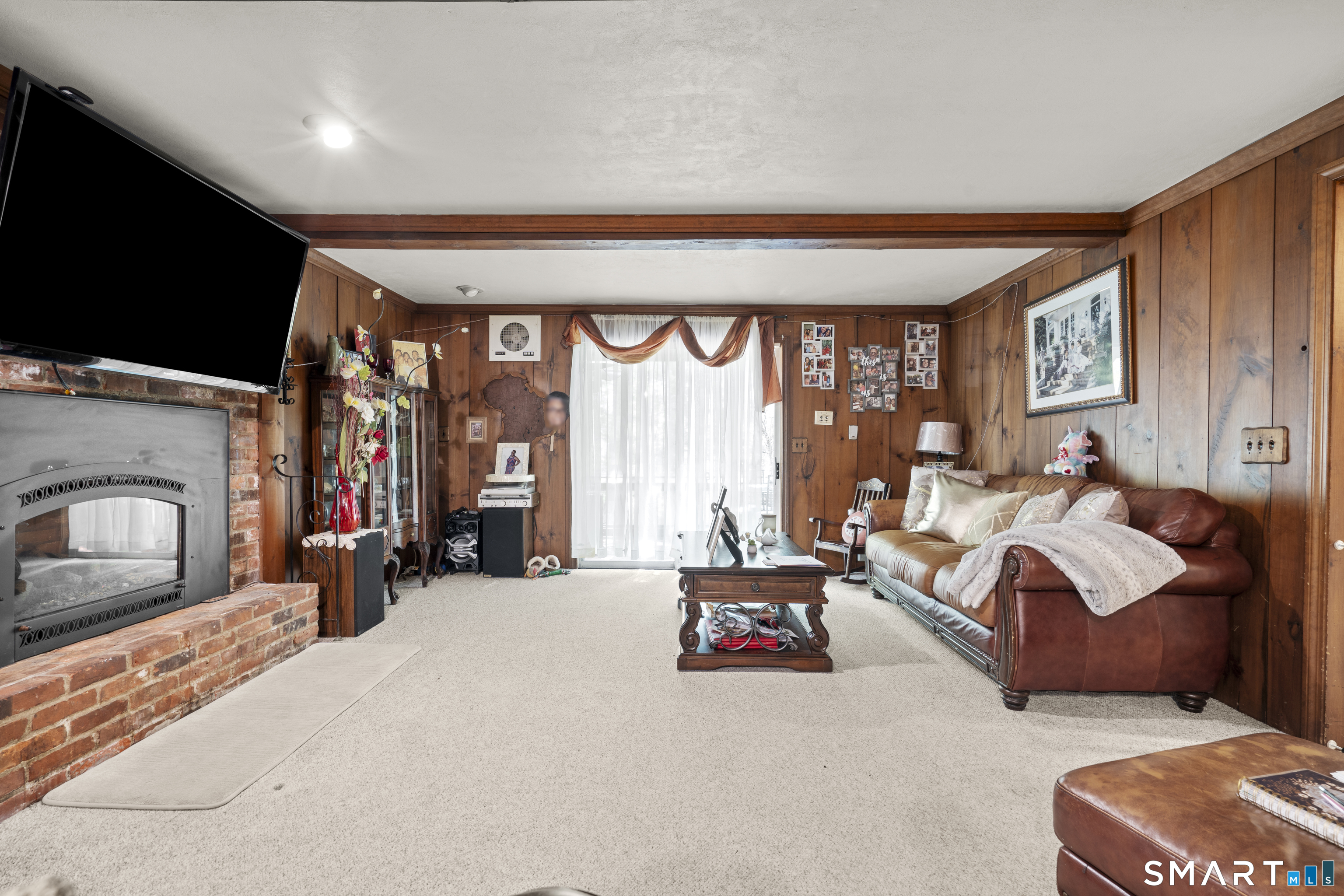 81 Meeting House Road Haddam, CT 06438 - Photo 13 of 35 a bedroom with furniture and a fireplace