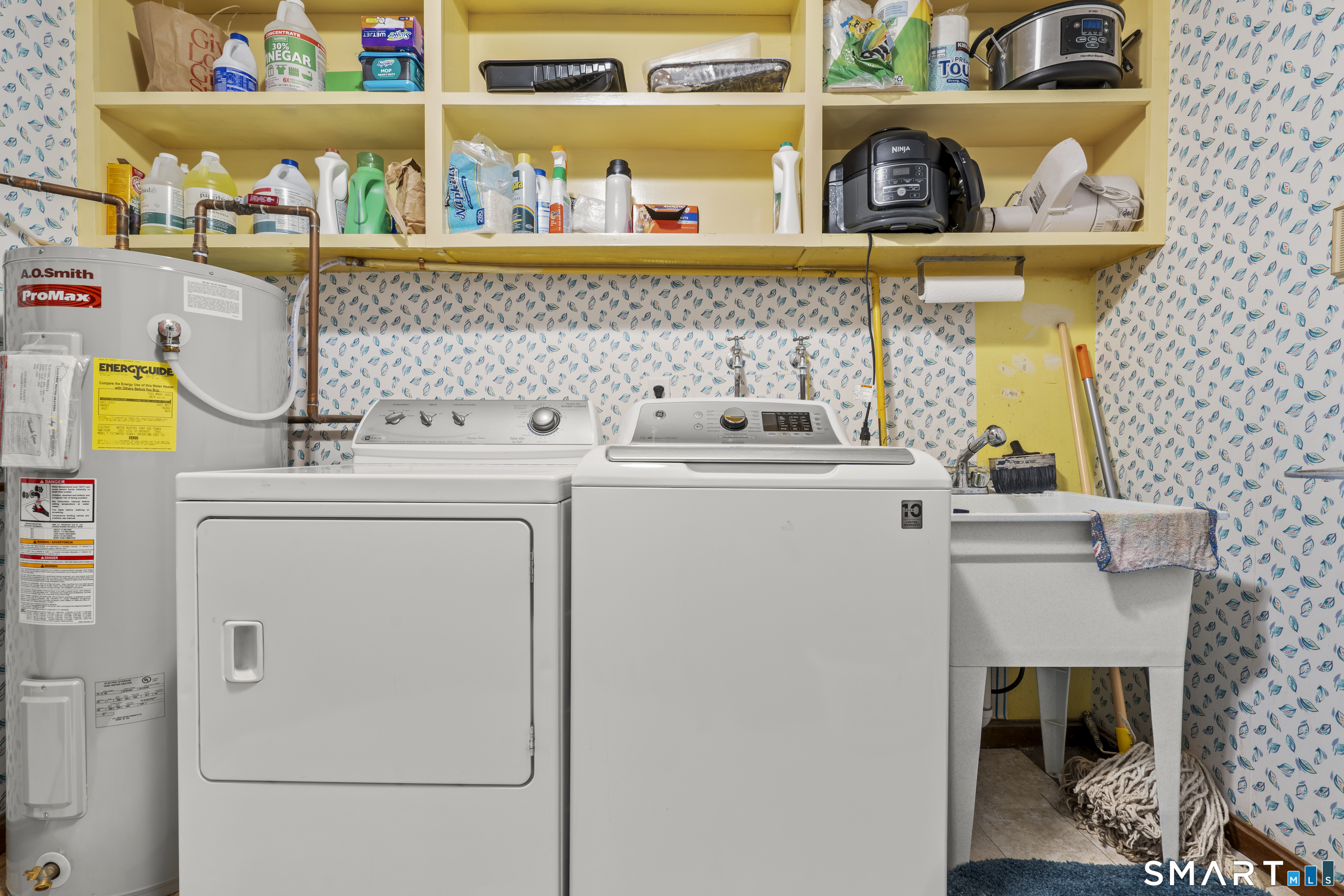 81 Meeting House Road Haddam, CT 06438 - Photo 15 of 35 a utility room with dryer and washer
