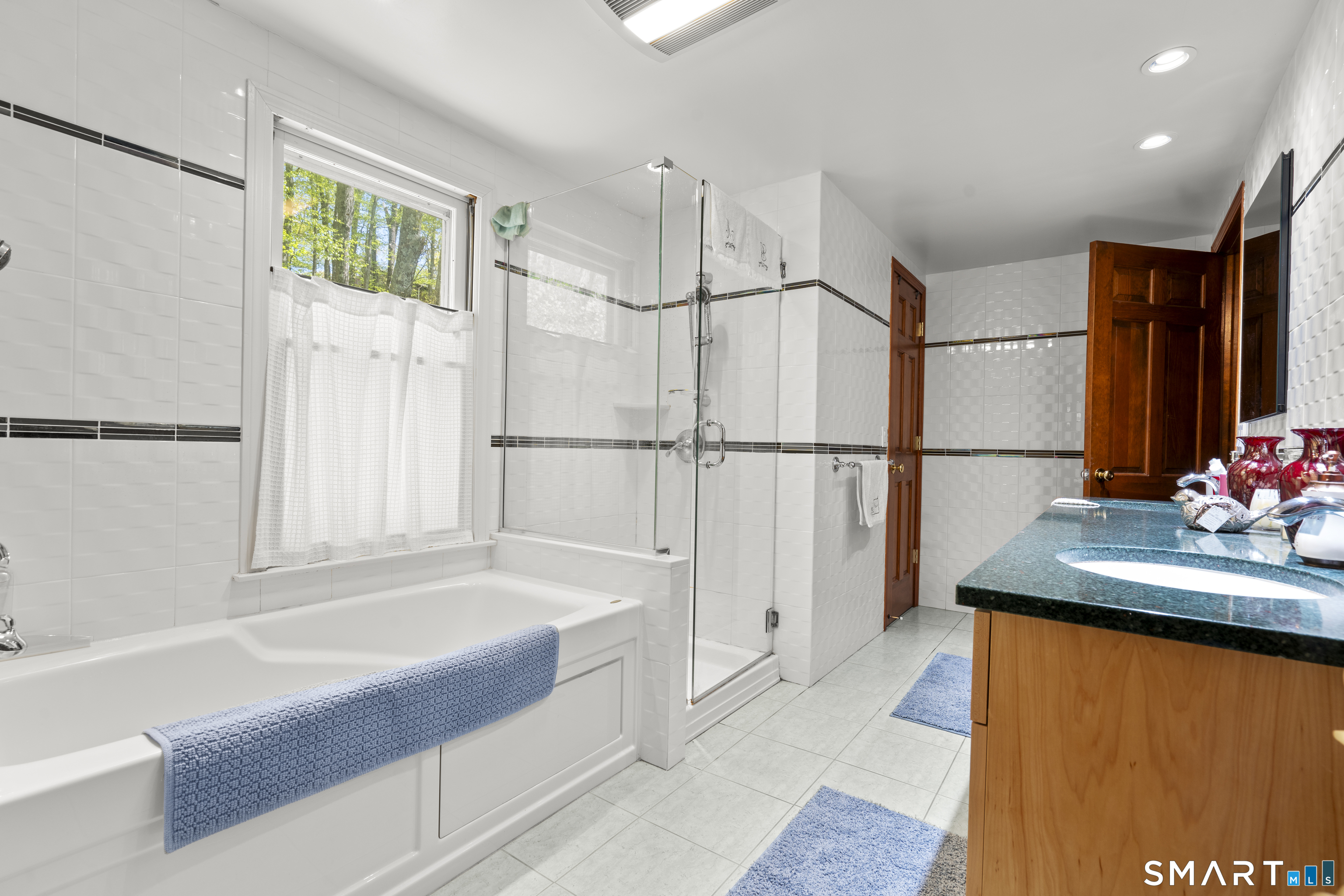 81 Meeting House Road Haddam, CT 06438 - Photo 24 of 35 a bathroom with a tub and a sink