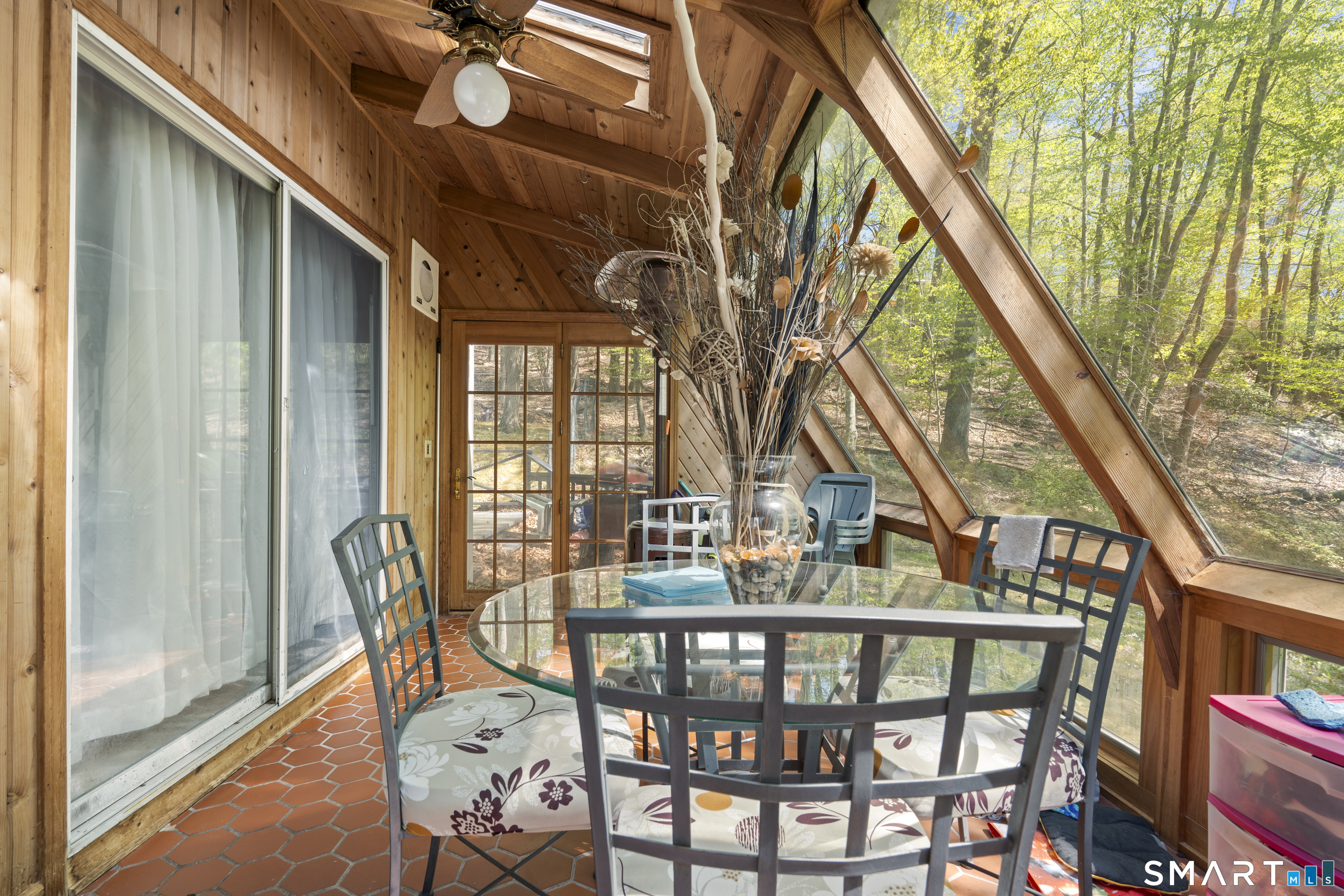 81 Meeting House Road Haddam, CT 06438 - Photo 28 of 35 a view of an chairs and table in the balcony