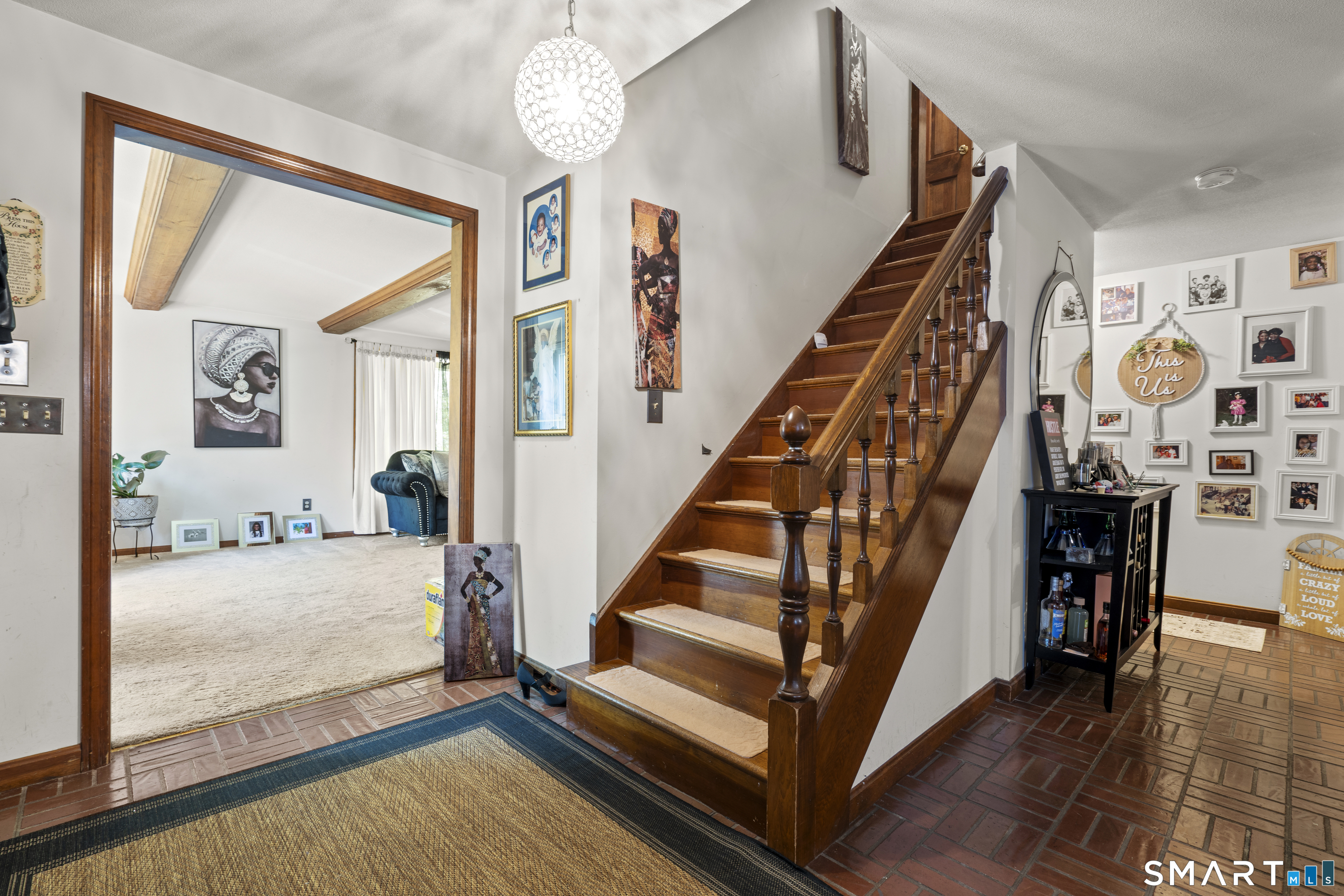 81 Meeting House Road Haddam, CT 06438 - Photo 5 of 35 a view of an entryway with wooden floor and windows
