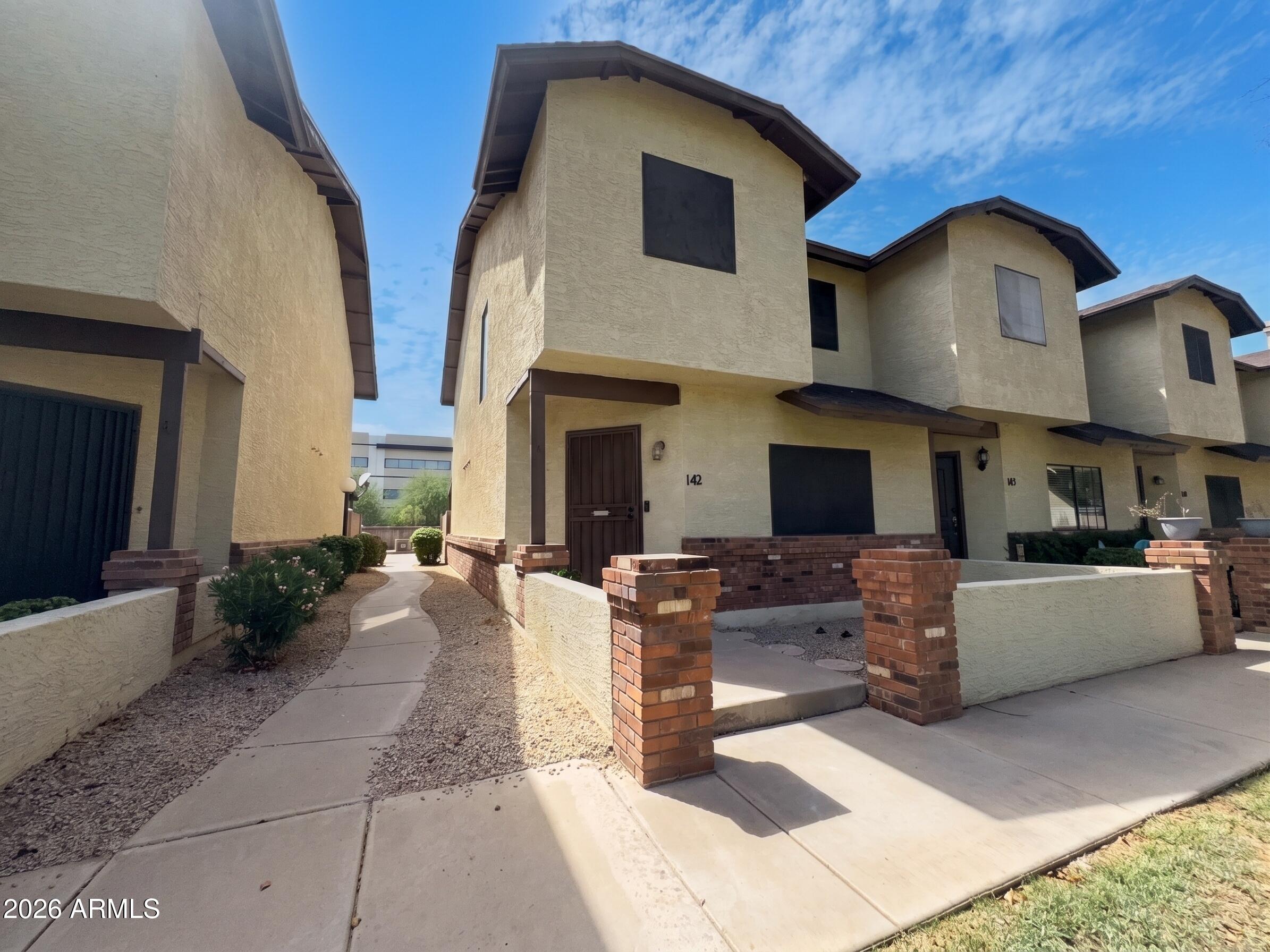 170 East Guadalupe Road, Unit 142 Gilbert, AZ 85234 - Photo 4 of 32 4 - End Unit
