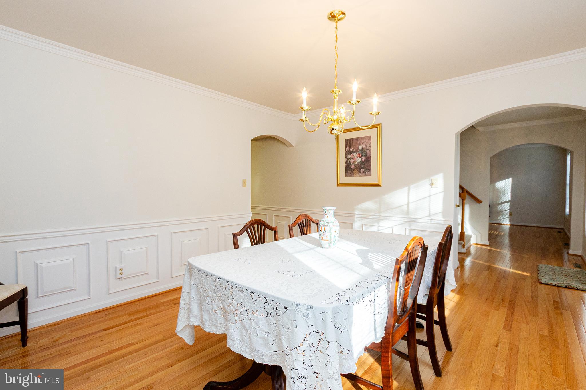20753 Chestnut Ridge Drive Leonardtown, MD 20650 - Photo 12 of 45 a view of a dining room with furniture and wooden floor