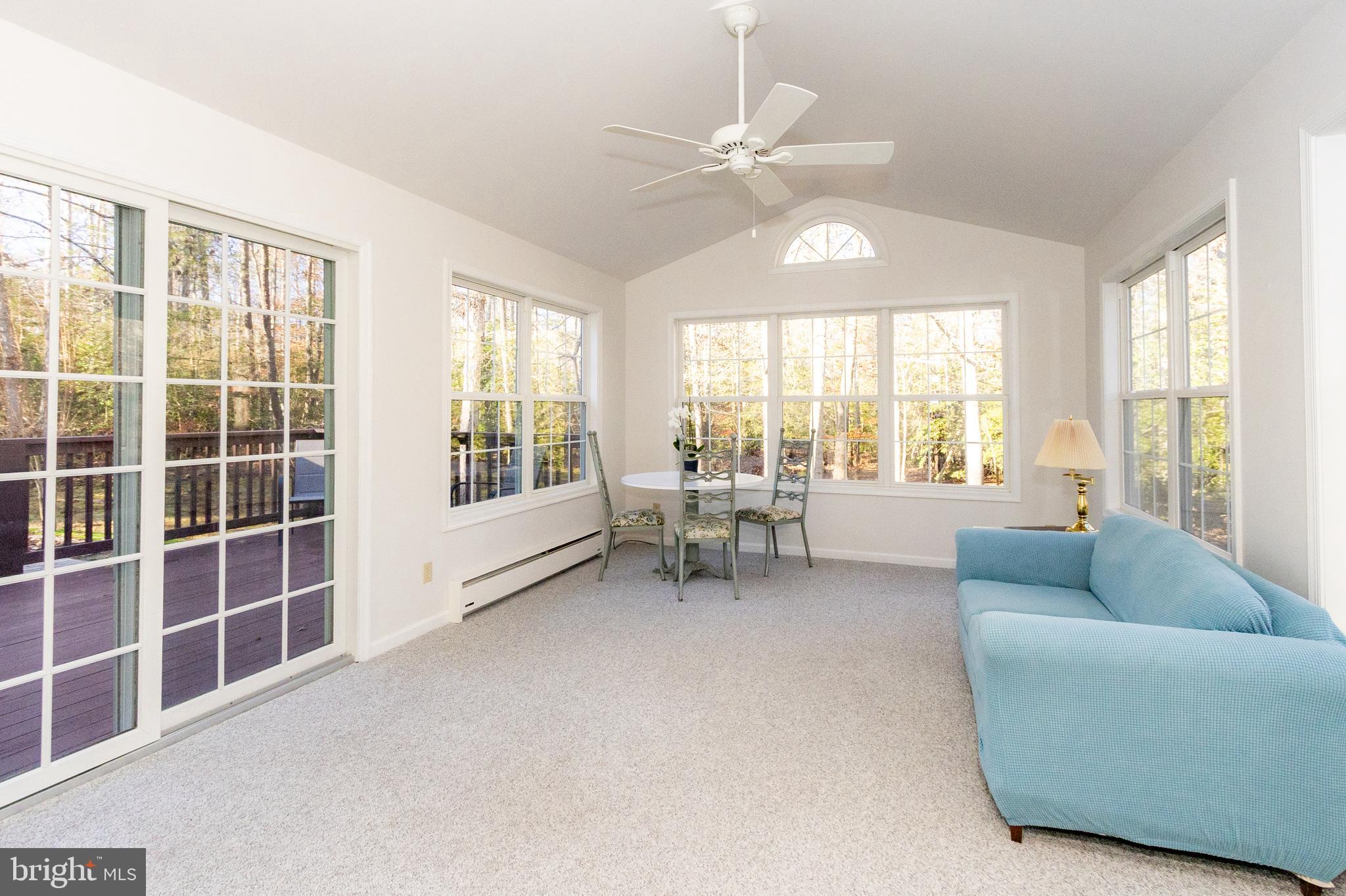 20753 Chestnut Ridge Drive Leonardtown, MD 20650 - Photo 21 of 45 a living room with furniture and a large window
