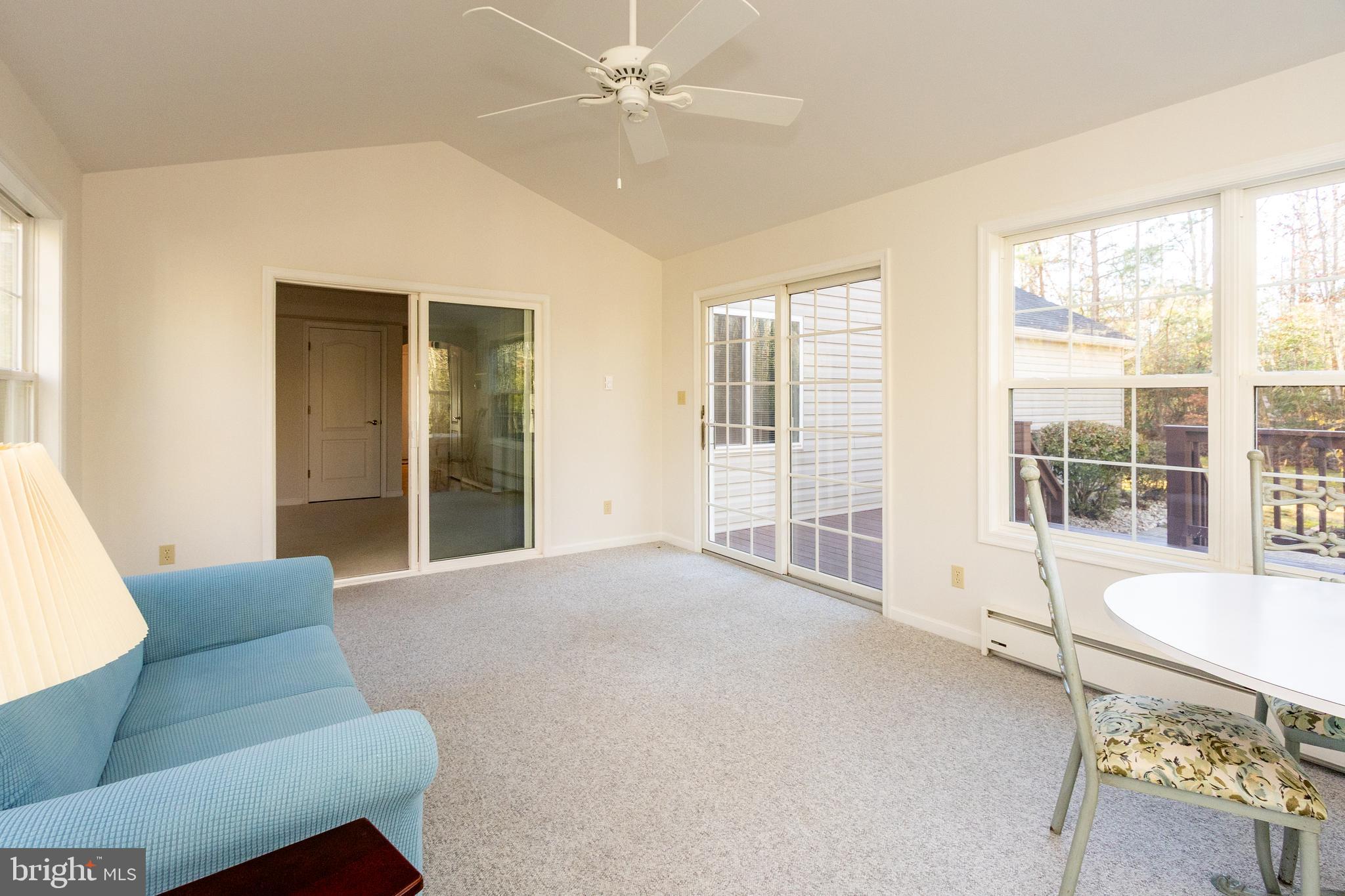 20753 Chestnut Ridge Drive Leonardtown, MD 20650 - Photo 23 of 45 a living room with furniture and a large window