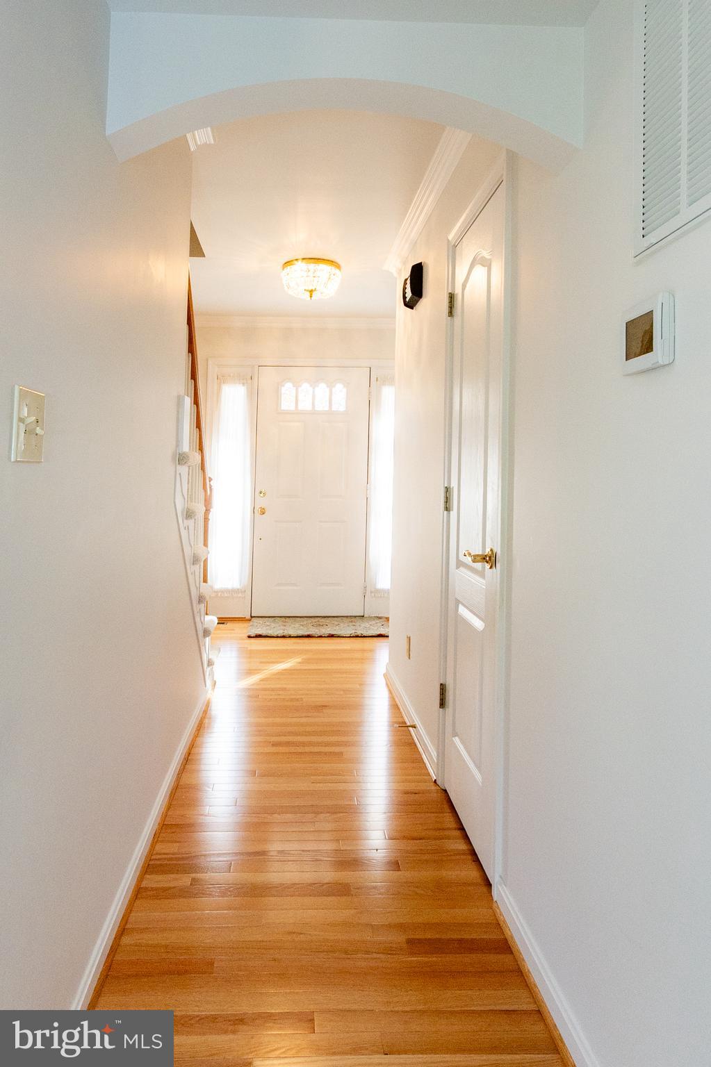 20753 Chestnut Ridge Drive Leonardtown, MD 20650 - Photo 24 of 45 a view of an empty room with wooden floor and a bathroom