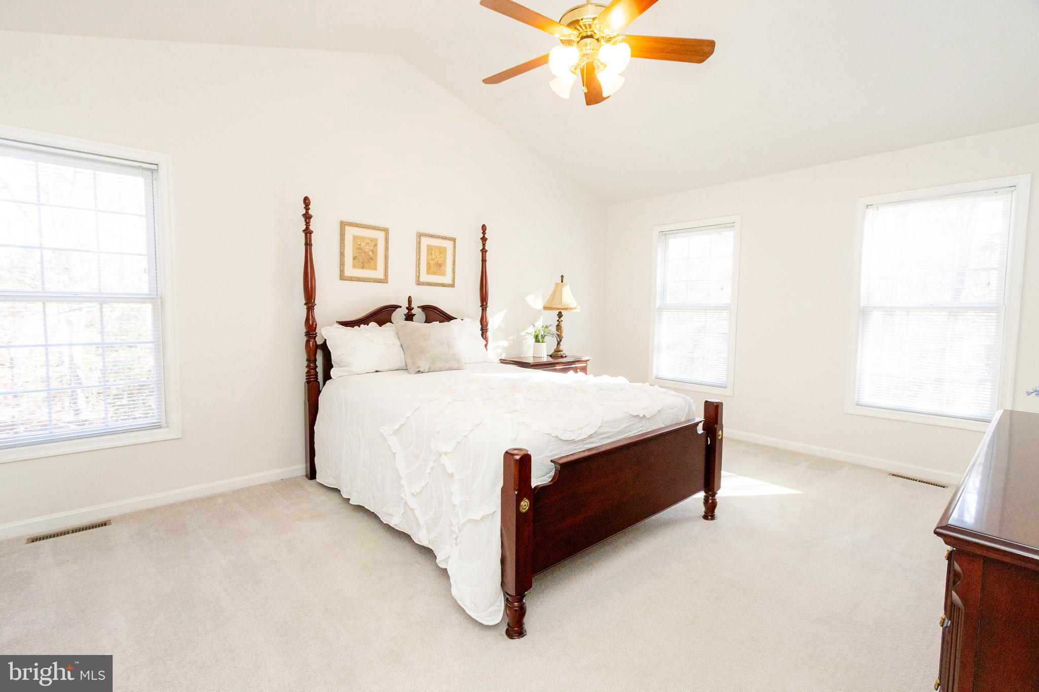 20753 Chestnut Ridge Drive Leonardtown, MD 20650 - Photo 25 of 45 a bedroom with a bed and a window