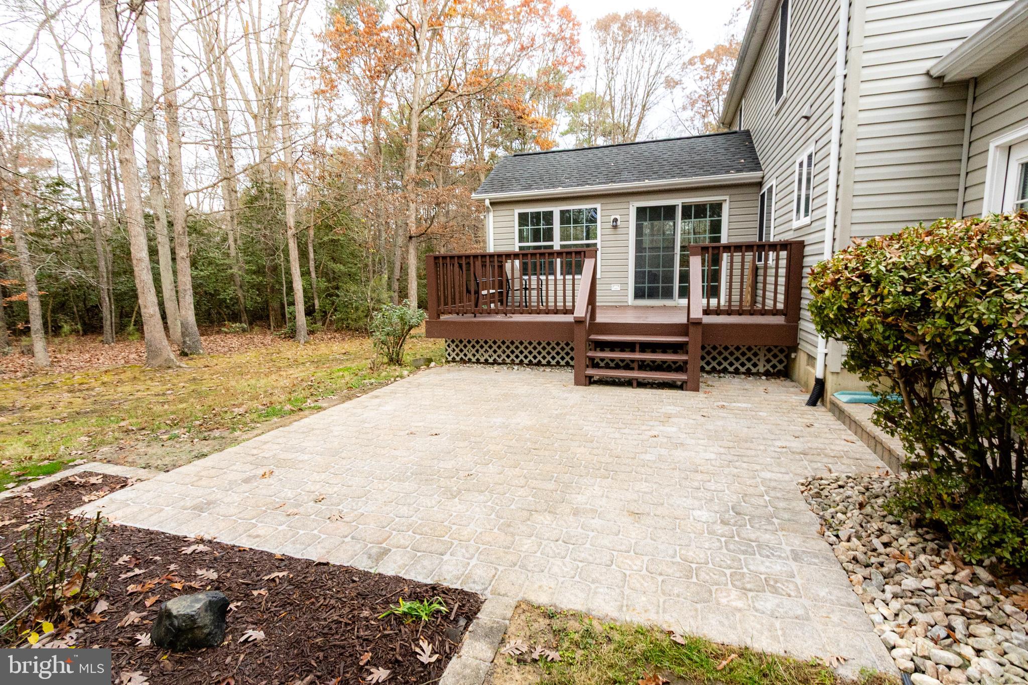20753 Chestnut Ridge Drive Leonardtown, MD 20650 - Photo 44 of 45 a front view of a house with a yard