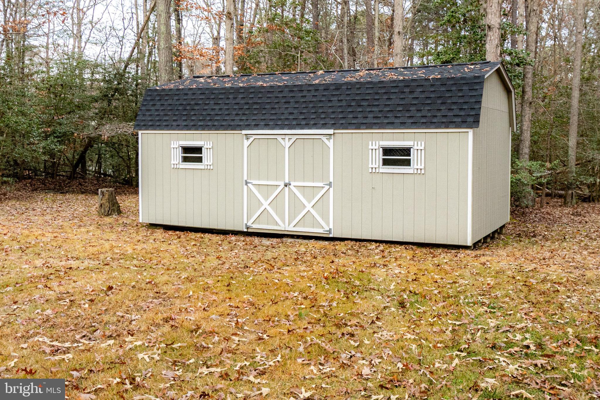 20753 Chestnut Ridge Drive Leonardtown, MD 20650 - Photo 45 of 45 a front view of a house with a yard