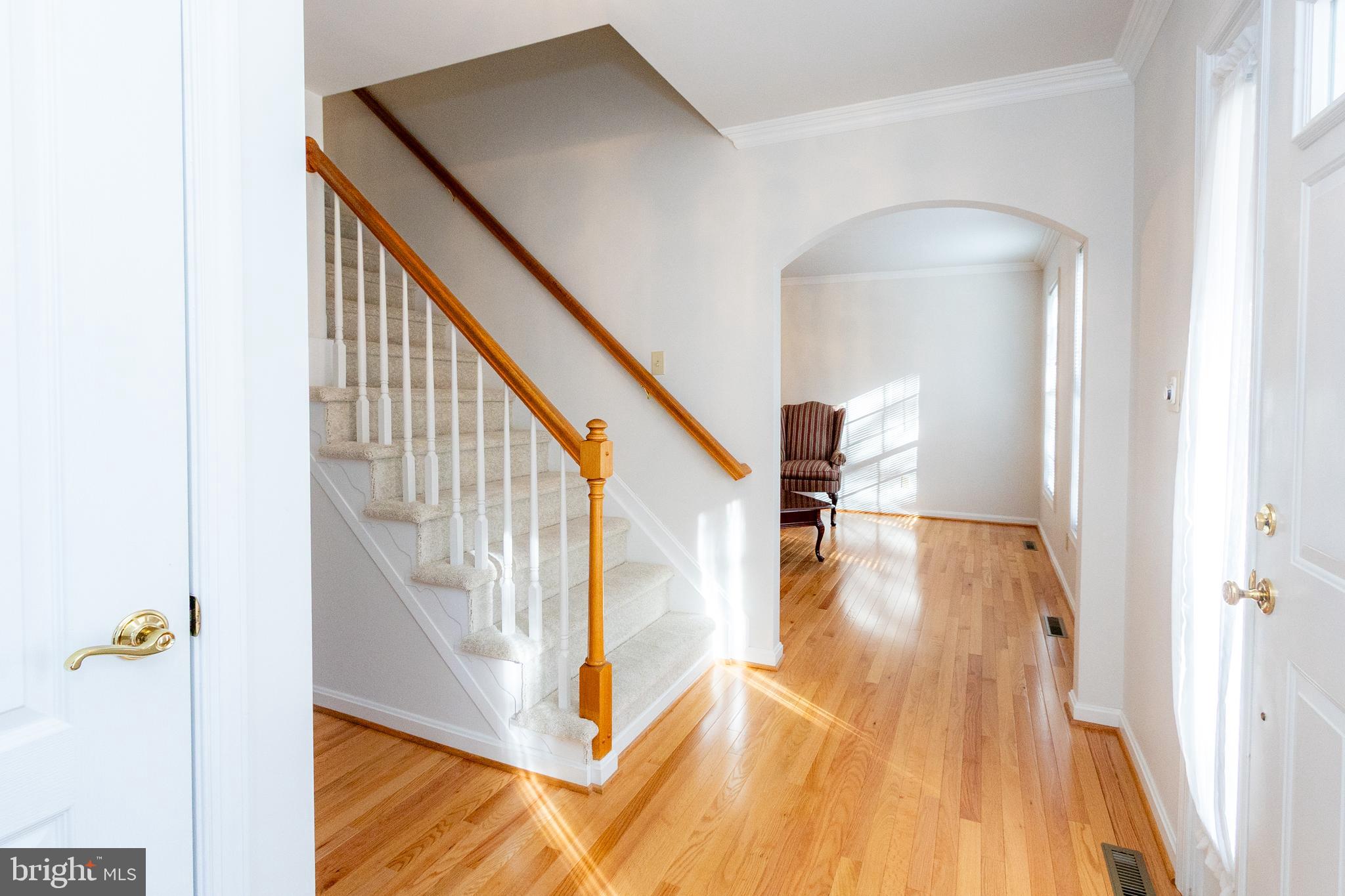 20753 Chestnut Ridge Drive Leonardtown, MD 20650 - Photo 6 of 45 a view of entryway and hall with wooden floor
