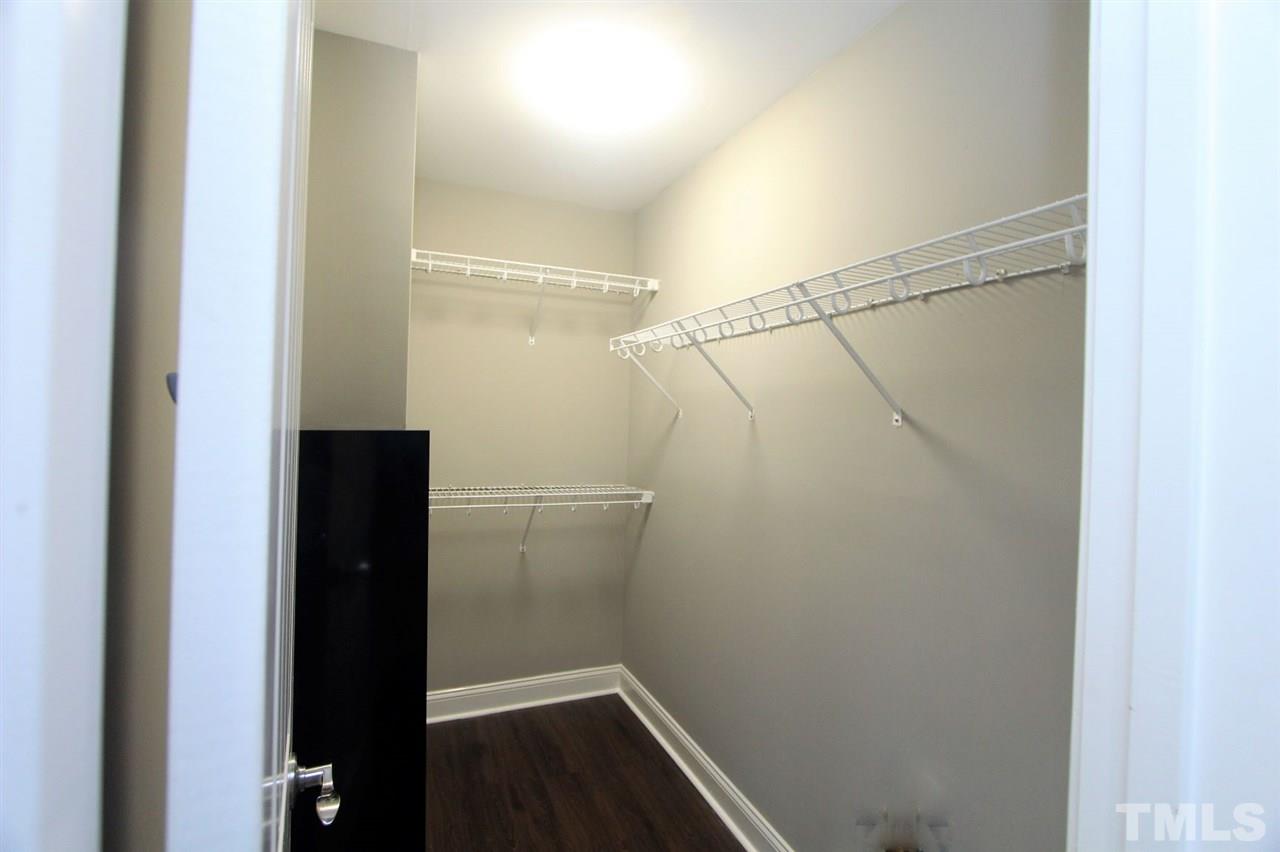 203 Orkney Road Stem, NC 27581 - Photo 19 of 30 a bathroom with a glass shower door