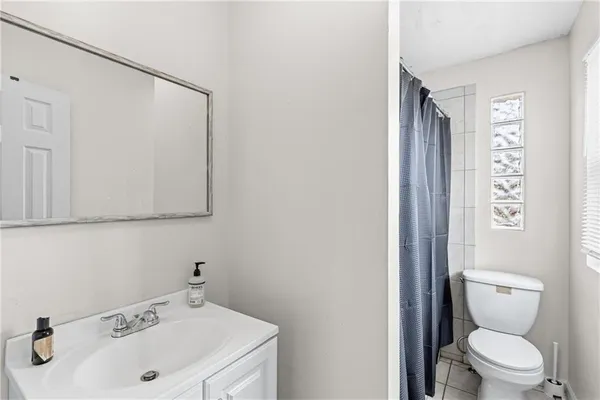 a room with a sink and utility room