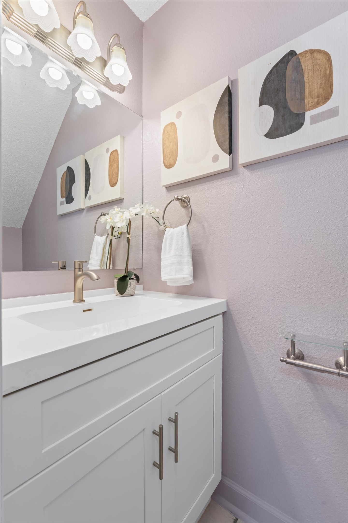 11902 Barrington Way Austin, TX 78759 - Photo 12 of 30 Half bathroom downstairs featuring vanity