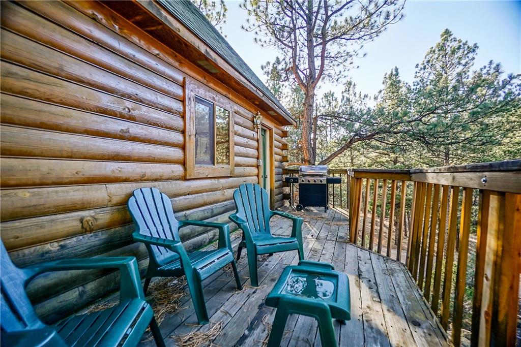 1276 South Crystal Road Lake George, CO 80827 - Photo 19 of 25 a balcony with chairs