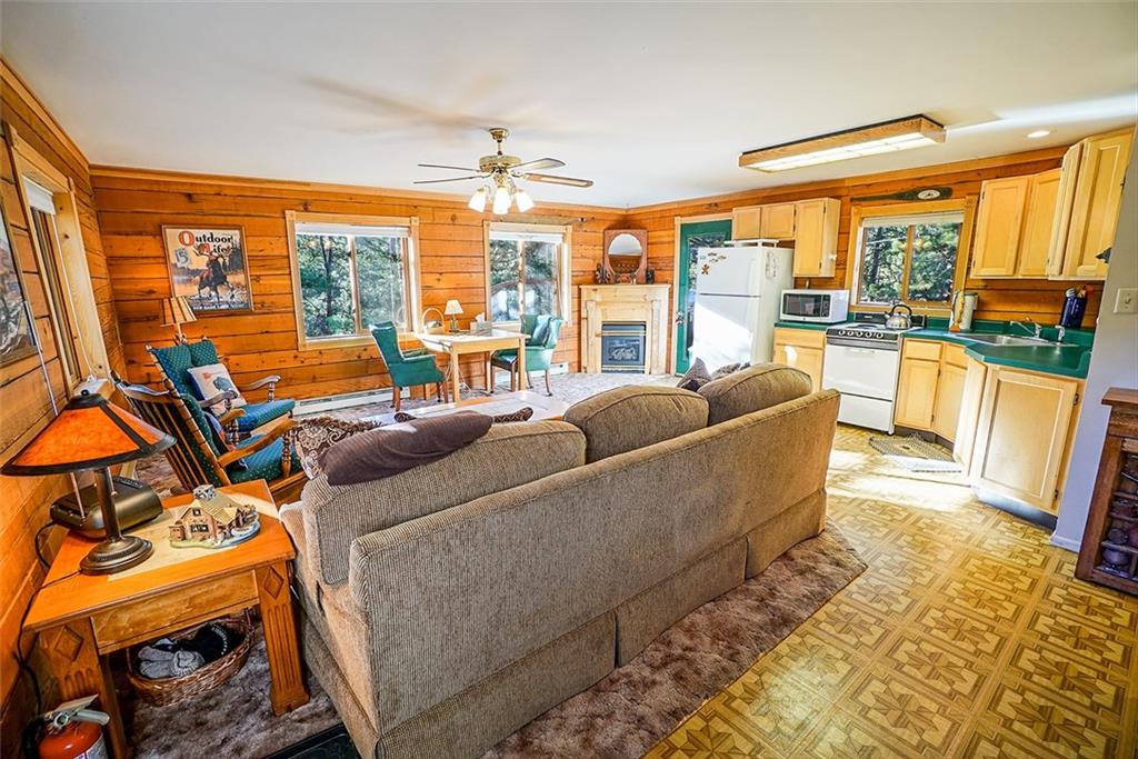1276 South Crystal Road Lake George, CO 80827 - Photo 4 of 25 a living room with furniture and a large window