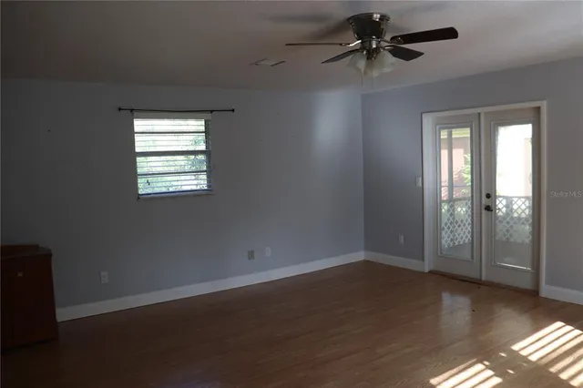 an empty room that has a window