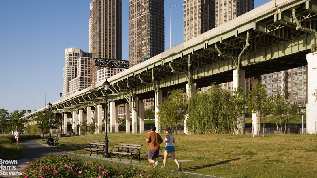 60 Riverside Boulevard, Unit 3004 Manhattan, NY 10069 - Photo 30 of 32 a view of a building with a yard