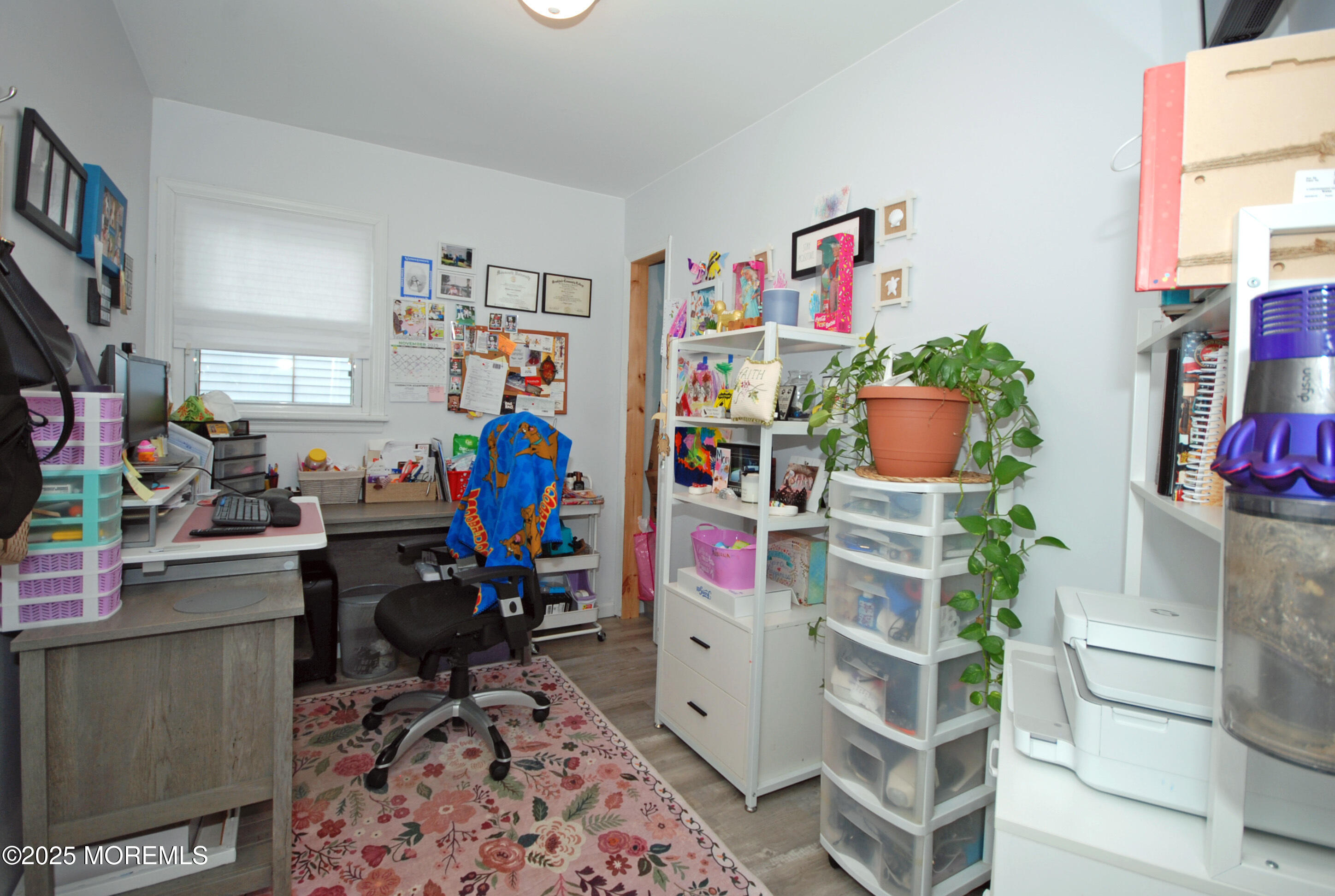 25 Beach Boulevard Highlands, NJ 07732 - Photo 26 of 32 a room with furniture a rug and a closet
