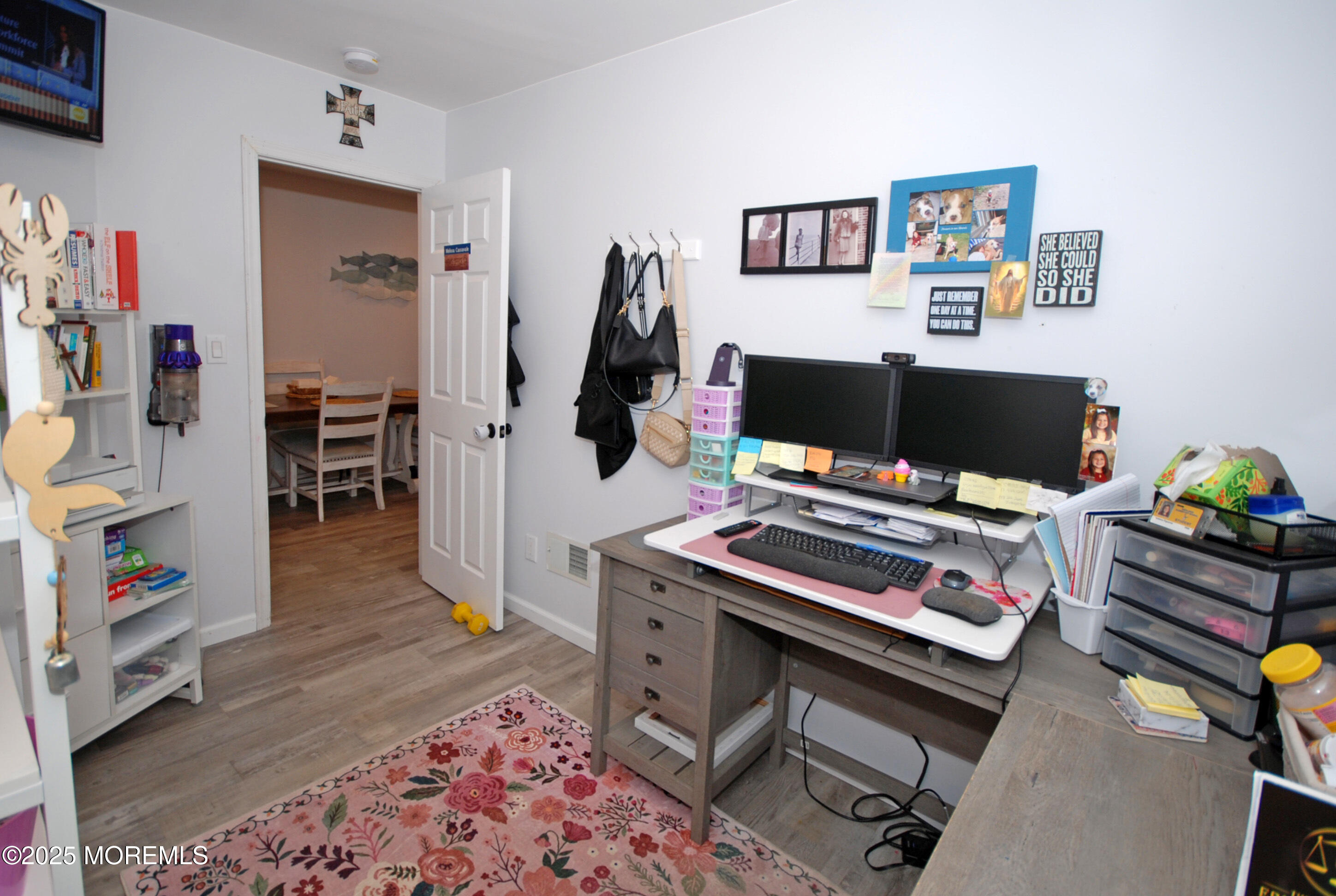 25 Beach Boulevard Highlands, NJ 07732 - Photo 27 of 32 a workspace with furniture and a flat screen tv