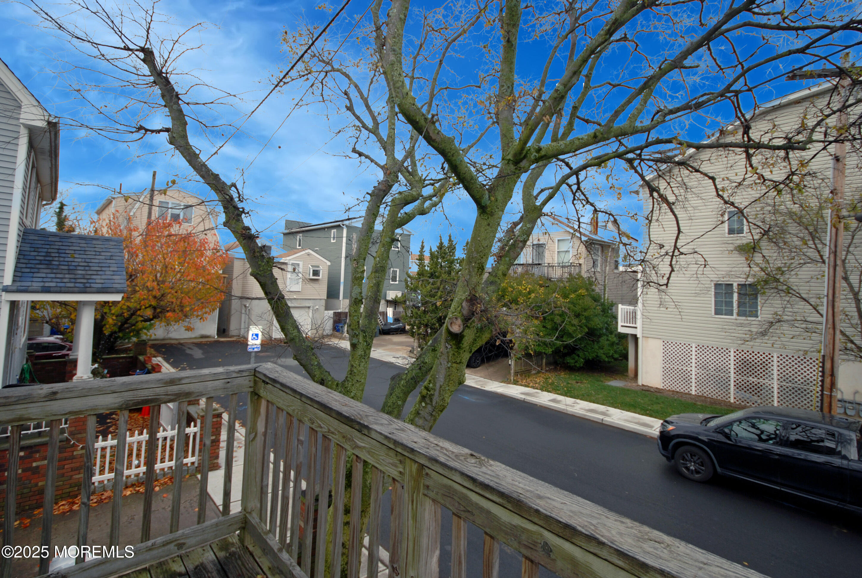 25 Beach Boulevard Highlands, NJ 07732 - Photo 4 of 32 a view of a street from a balcony